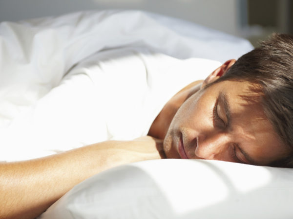 Closeup of Young man relaxing with eyes closed