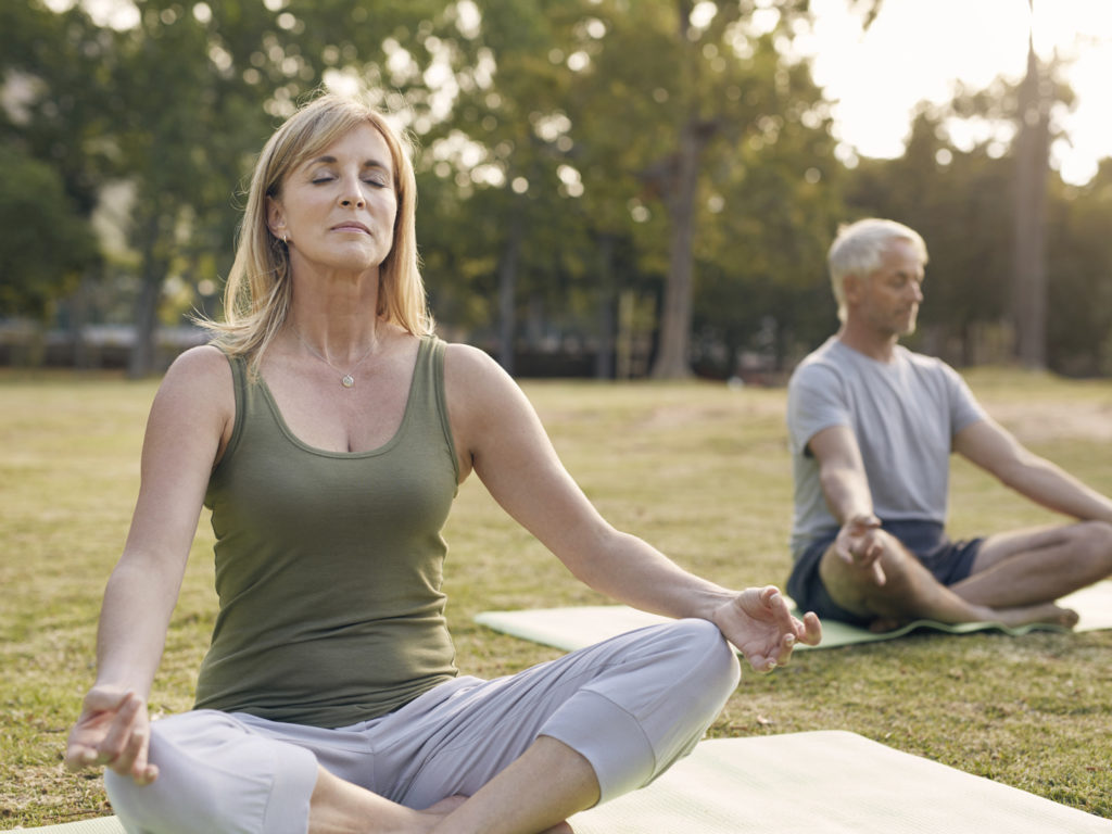 Shot of a mature couple meditating outdoorshttp://195.154.178.81/DATA/i_collage/pu/shoots/805496.jpg