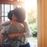 A young woman hugging her husband after receiving flowers from himhttp://195.154.178.81/DATA/i_collage/pu/shoots/784179.jpg