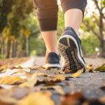 Woman walk in park outdoor Trail exercise Healthy lifestyle Autumn fall